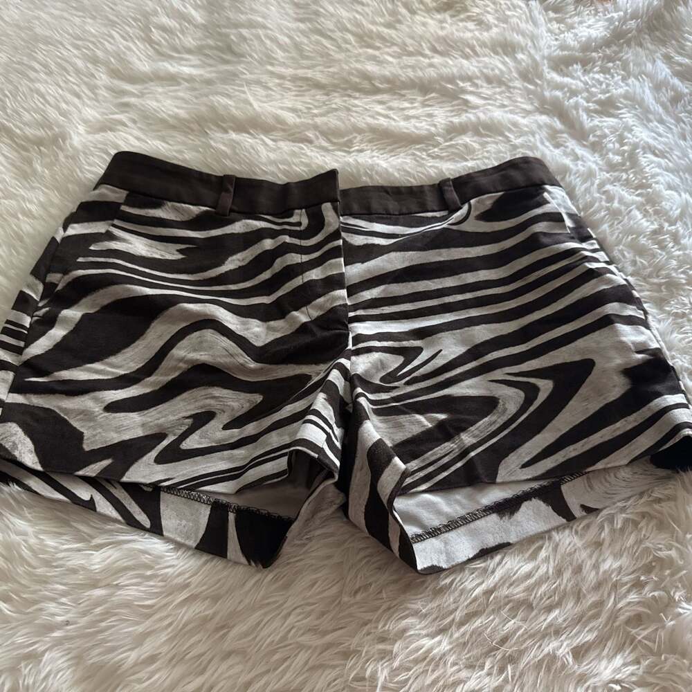 Michael Kors brown and‎ white zebra pattern shorts. Size 6